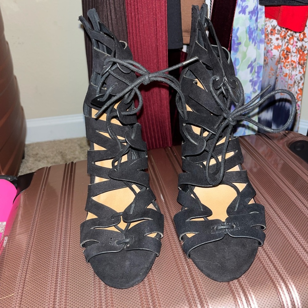 Black strap up heels